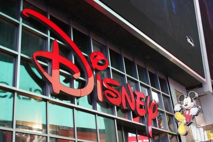 shutterstock_2212408911.jpg featured image Disney sign on building with Mickey Mouse figure