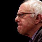 Bernie Sanders in glasses.