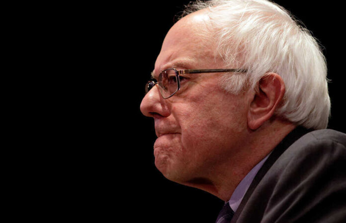 shutterstock_388723837.jpg featured image Bernie Sanders in glasses.