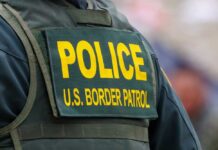 Back of US Border Patrol officers vest