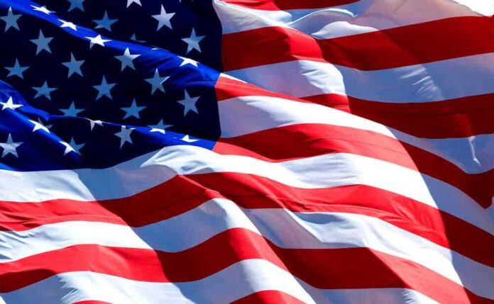 shutterstock_267522383-1.jpg featured image USA flag waving in the wind.