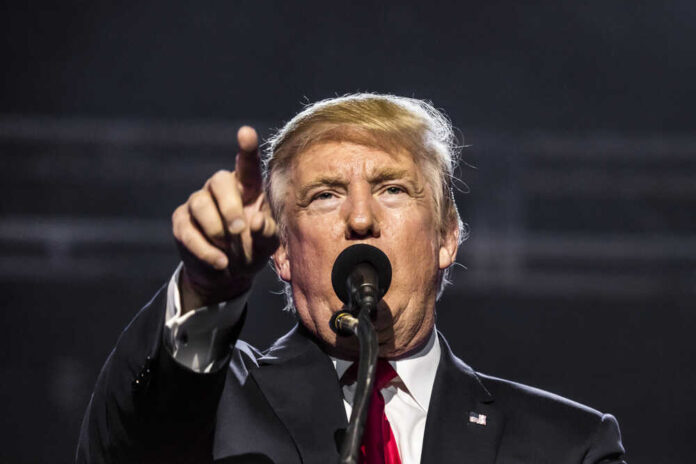 shutterstock_636139745.jpg featured image Donald Trump, points while speaking.