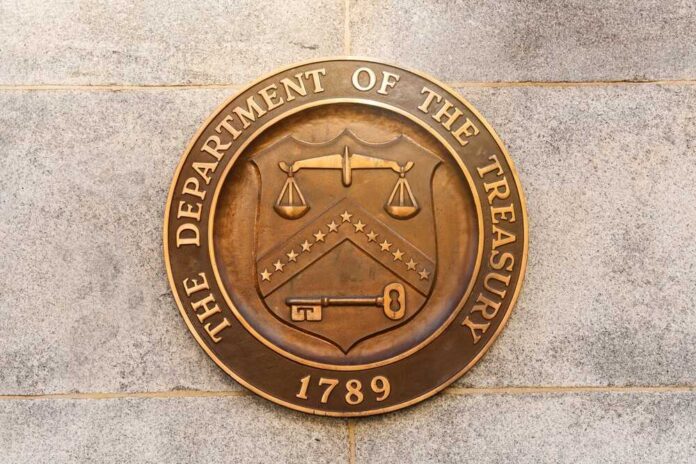 shutterstock_2272426623.jpg featured image Department of the Treasury seal on stone wall