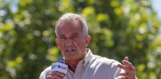 Robert F Kennedy, or RFK, speaking outdoors.