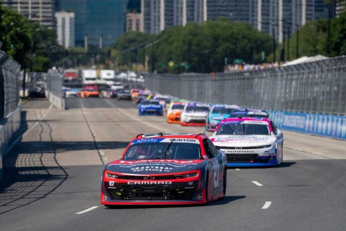 shutterstock_2489533817.jpg featured image Stock car race on urban street circuit.