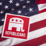 Republican party logo on American flag background.