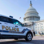 Police vehicle outside United States Capitol building