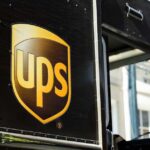 Black delivery truck with UPS logo visible