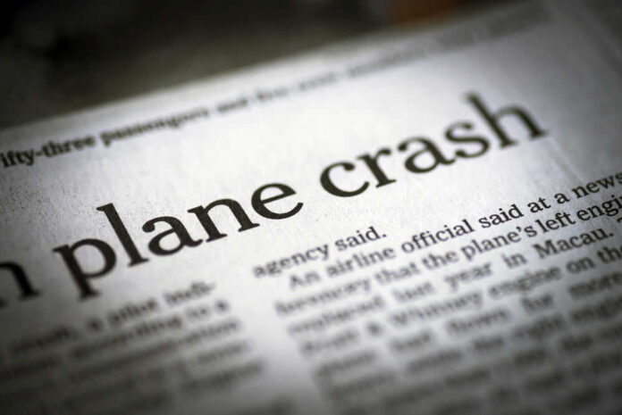 shutterstock_290501621.jpg Newspaper headline about a plane crash