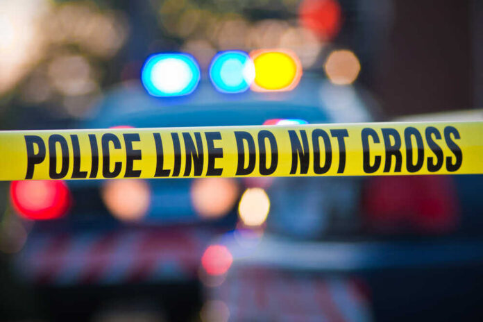 shutterstock_56280433.jpg featured image Police tape and lights at crime scene.