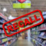 Blurred store aisle with RECALL stamp overlay