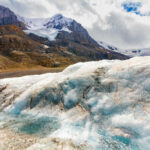 Snowy mountain landscape with glacial ice and rocks