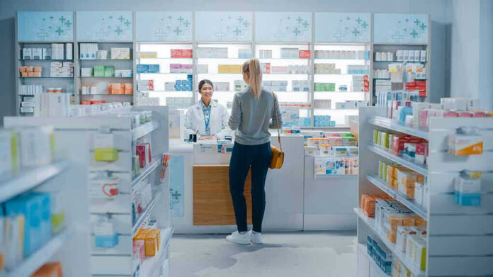 Customer talking to pharmacist