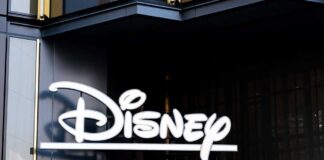 Disney logo displayed on a modern building
