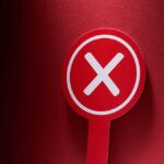 Stunning Poll: Trump’s GOP Base Rejects Greenland Plan Red sign with a white cross symbol on a dark background
