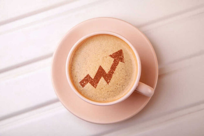 Coffee cup with upward trending arrow design