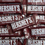 A pile of Hershey's milk chocolate bars stacked together