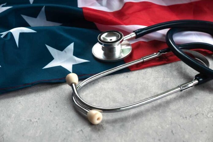 A stethoscope resting on an American flag