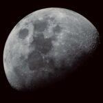 Close-up view of the moon showing craters and surface details