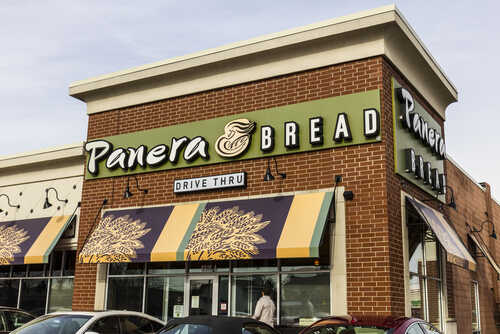 shutterstock_541311784 (1).jpg Exterior view of a Panera Bread restaurant with a drive-thru