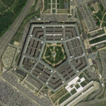 Aerial view of the Pentagon building surrounded by roads and parking lots