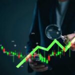 Business professional analyzing stock market trends with a magnifying glass