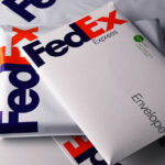 Various FedEx envelopes stacked together