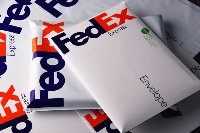 Various FedEx envelopes stacked together