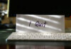 Envelope reading I Quit behind keyboard.