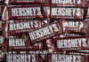 A pile of Hershey's milk chocolate bars stacked together
