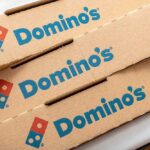 Stack of Domino's pizza boxes