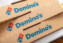 Stack of Domino's pizza boxes