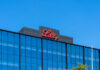 Eli Lilly’s Game-Changer Pill: No Needles, No Hassle Lilly logo on a modern glass building rooftop