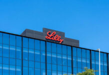Eli Lilly’s Game-Changer Pill: No Needles, No Hassle Lilly logo on a modern glass building rooftop