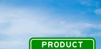 Green sign with product recall text and sky background