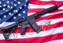 Deadly Vulnerability EXPOSED in US Weapon Systems AR-15 Rifle and bullets on American flag background