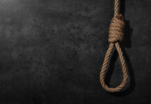 Secret Courts: More Hangings Revealed A noose made of rope hanging against a dark textured background