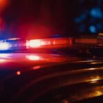 VIDEO: Carjacker KILLED — Eight Lives Saved Close-up of a police car's emergency lights at night