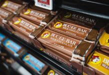 Display of Buc-ee's milk chocolate bars on a store shelf
