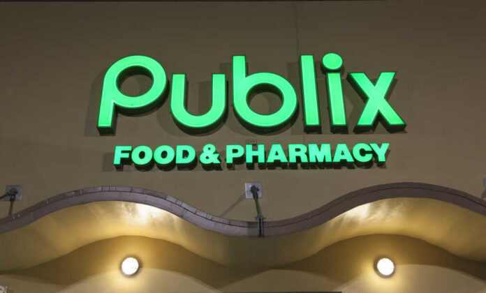 Illuminated Publix Food & Pharmacy sign at night