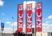 Chicken Wars Escalate: KFC’s Wild Reboot KFC restaurant sign against a blue sky