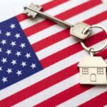 House key with keychain on American flag