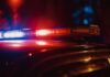 6 Dead: Bloody Weekend Jolts Lib City Close-up of a police car's emergency lights at night