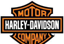Harley Showdown Erupts Over ‘Woke’ Bosses Harley-Davidson logo in orange and black colors.