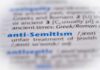 Close-up of a dictionary entry for the term 'anti-Semitism'