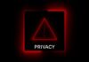 Ad Machine Incoming — Privacy Next? A red neon privacy warning sign with an exclamation mark