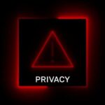 A red neon privacy warning sign with an exclamation mark