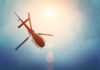 VIDEO: Deadly Fireball As Two Copters Collide A helicopter flying against a bright sky
