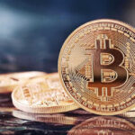 DOJ Kills $722M Crypto Case? Bitcoin coins on a reflective surface.