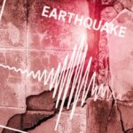 Seismograph showing earthquake amplitude on a cracked wall